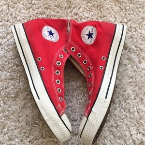 Men’s red and white hightop converse